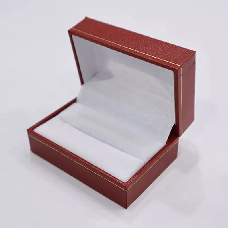 Right-angled straight-edge box with red curves and gold patterns