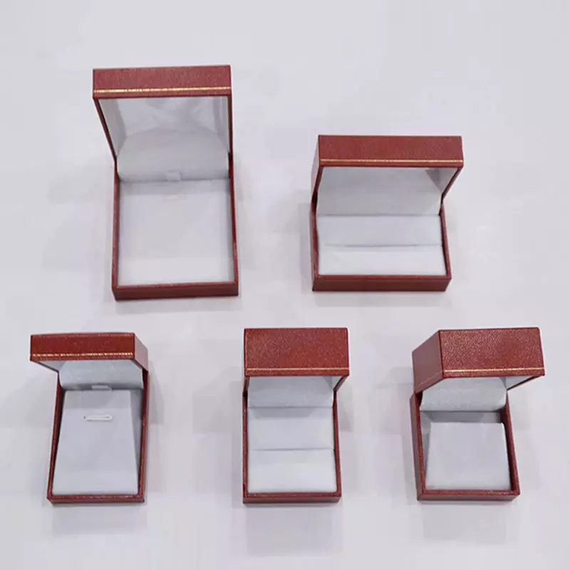 Right-angled straight-edge box with red curves and gold patterns