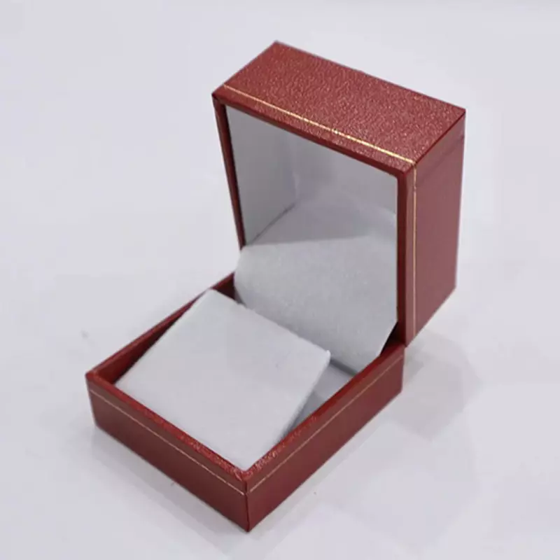 Right-angled straight-edge box with red curves and gold patterns